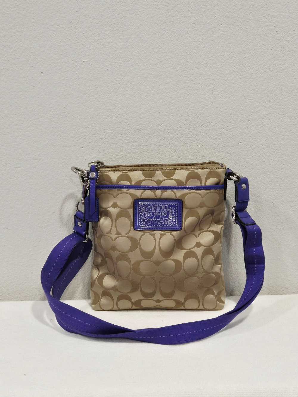 Coach Poppy Signature C Swingpack Crossbody with Purple Accents